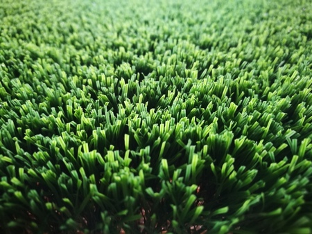 Green artificial grass close up.の写真素材