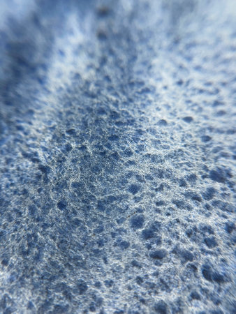 Watercolor navy blue black granulation abstract grunge texture background macro photo.