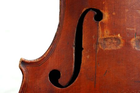 Detail of a treble clef at a old fiddle