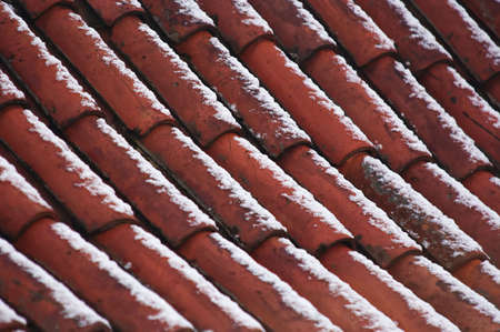 snowy roof - clay tileの写真素材