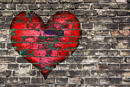 heart on the old broken brick wallの写真素材