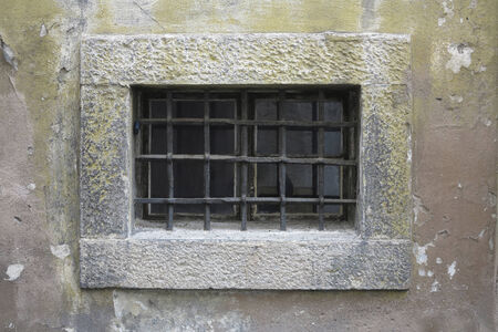 old barred window