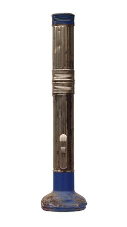 Old used electric torch on white backgroundの写真素材