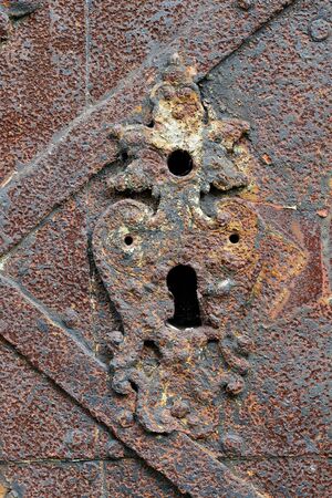 Detail of the keyhole in old rusty lockの写真素材
