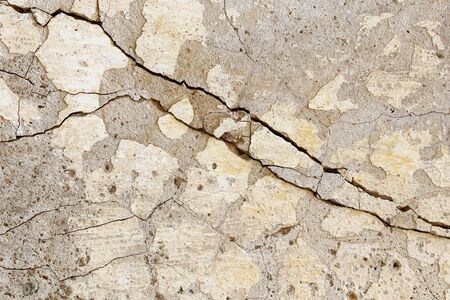 Detail of the cracks in the old wallの写真素材