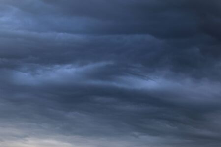 Dark clouds on sky before rainy and stormの写真素材