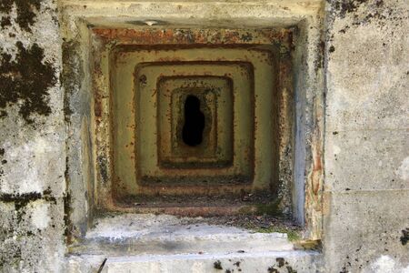Loophole - machine-gun slit in an old military bunkerの写真素材