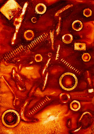 Imprint of rusty screws, bolts, nuts, springs and other itemsの写真素材