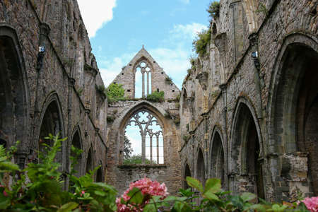 Paimpol, France, August 15, 2019: The Abbaye de Beauport, famous cloister in ruins.のeditorial素材