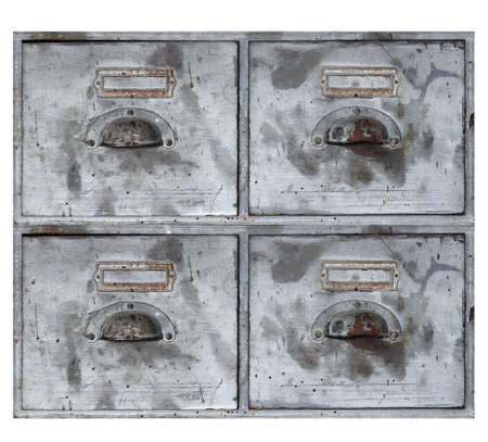 Old, used and damaged drawers isolated on backgroundの写真素材