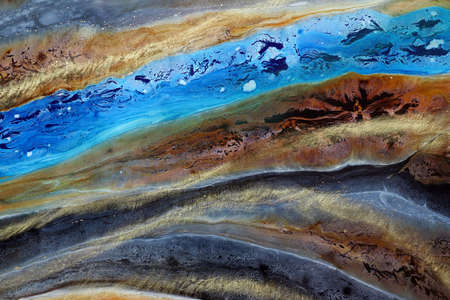 Fluid colors - abstract image from poured colorsの写真素材