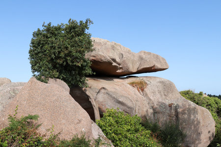 Boulders on the Cote de Granit Rose - Pink Granite Coast - in Brittany, Franceの写真素材