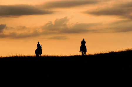 Image of the romantic horseback ride - couple on the horsesの写真素材