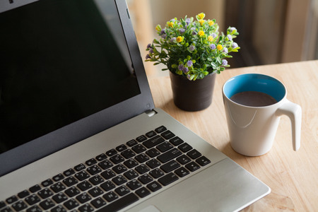 Working time with a cup of coffeeの写真素材