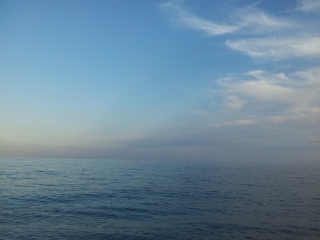 cloudy sky over the seaの写真素材