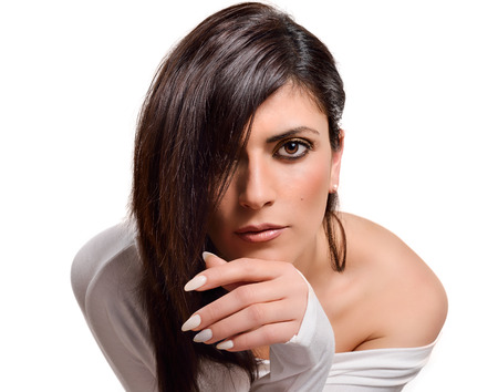 Portrait of a beautiful caucasian woman on a white backgroundの写真素材