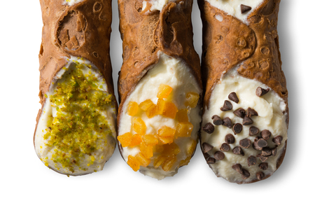 Traditional homemade Sicilian sweet called cannoli stuffed with cream cheeseの写真素材