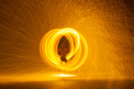The Man Spinning Fire  Show On Samet Islandの写真素材