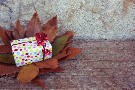 Little colourful gift. Christmas present. Holiday. Space. Backgroundの写真素材