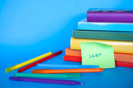 Books arranged in the shape of the lgtb flag with its colors. reading opens the mind, makes you understand, accept. respect for all people.の写真素材