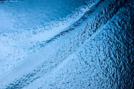 detail of a bubbled glass with blu natural gradientの写真素材