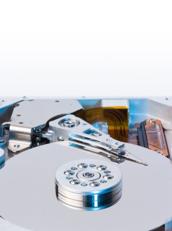 closeup of an hard drive with coloured light