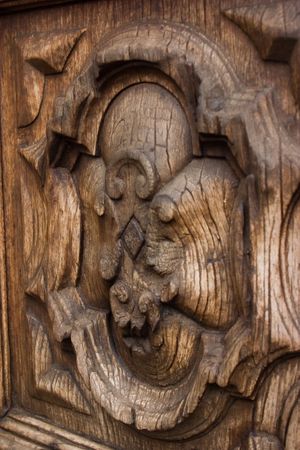 ancient wood door in Saluzzo, a beautiful town in Italyの写真素材