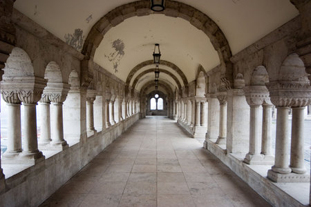 ancient white corridor with arch in budapest