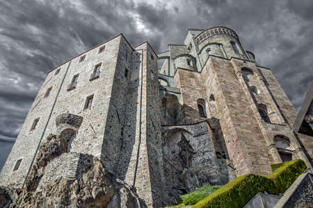 Dramatic Sky over Sacra di San Michele - Saint Michael abbey, the ancient medieval abbey near Tourin in the North of Italyのeditorial素材