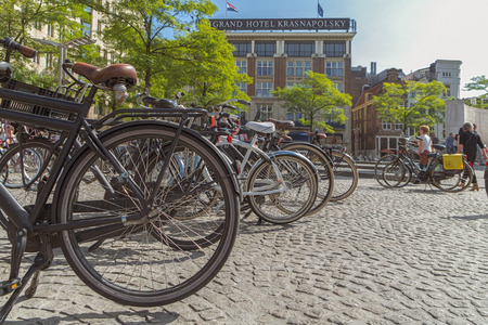 Amsterdam / Holland - 9/12/14 View of amsterdam square with bikes and hotelのeditorial素材