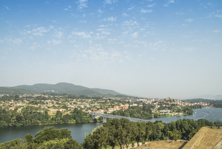 View from portugal to spain. With the bridge marking the borderの写真素材