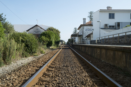 Train tracks in an old station in the north of portugalの写真素材