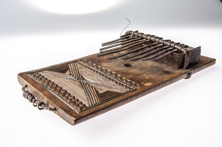 African handmade music instrument isolated on white backgroundの写真素材