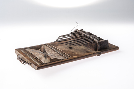 African handmade music instrument isolated on white backgroundの写真素材