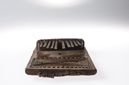 African handmade music instrument isolated on white backgroundの写真素材