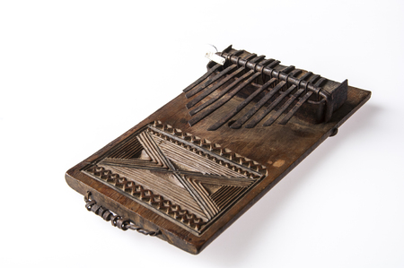 African handmade music instrument isolated on white backgroundの写真素材