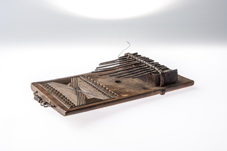 African handmade music instrument isolated on white backgroundの写真素材