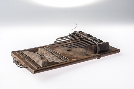 African handmade music instrument isolated on white backgroundの写真素材