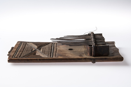 African handmade music instrument isolated on white backgroundの写真素材