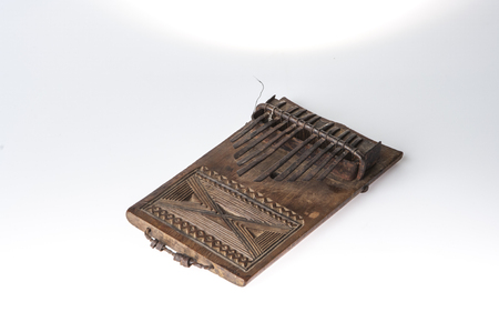 African handmade music instrument isolated on white backgroundの写真素材
