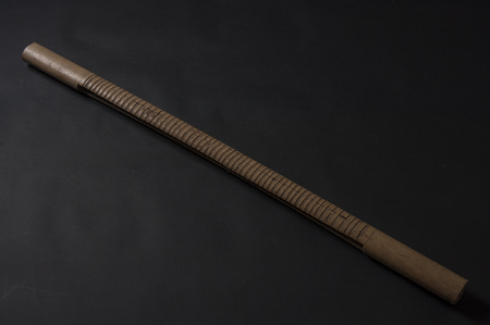 African handmade music instrument isolated on dark backgroundの写真素材
