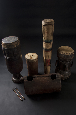 Set of african musical instruments isolated on dark backgroundの写真素材