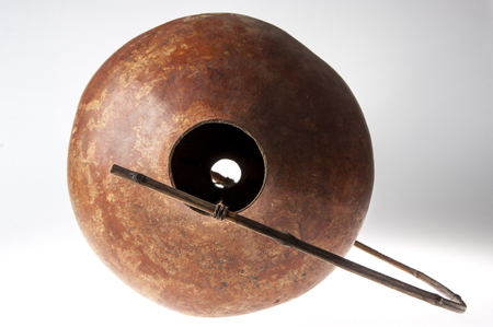 African handmade instrument, blowing, isolated on white backgroundの写真素材