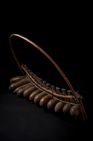 African music instrument, wooden marimba with two bakets, isolated on dark backgroundの写真素材