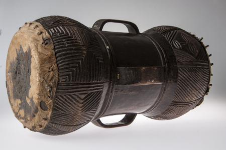 African music instrument, drum made of wood, isolated on white backgroundの写真素材