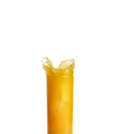 Glass of orange juice with splash isolated on white backgroundの写真素材