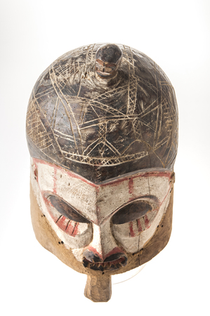 African wooden mask isolated on white backgroundの写真素材