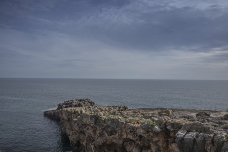 Rocky beach of the mouth of hell, cascais portugalの写真素材