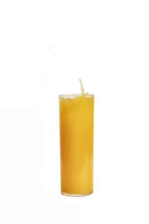Glass of orange juice with splash isolated on white backgroundの写真素材