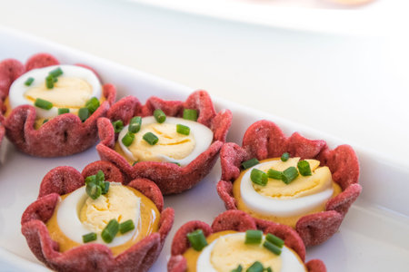 Glasses with egg of coderniz with mustard sauce and mayonnaise, gormet foodの写真素材